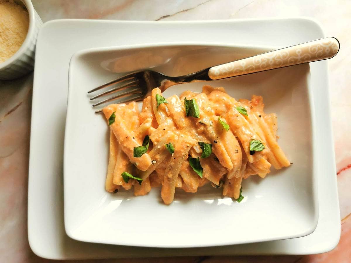 Sicilian pesto in a bowl with pasta and ricotta.