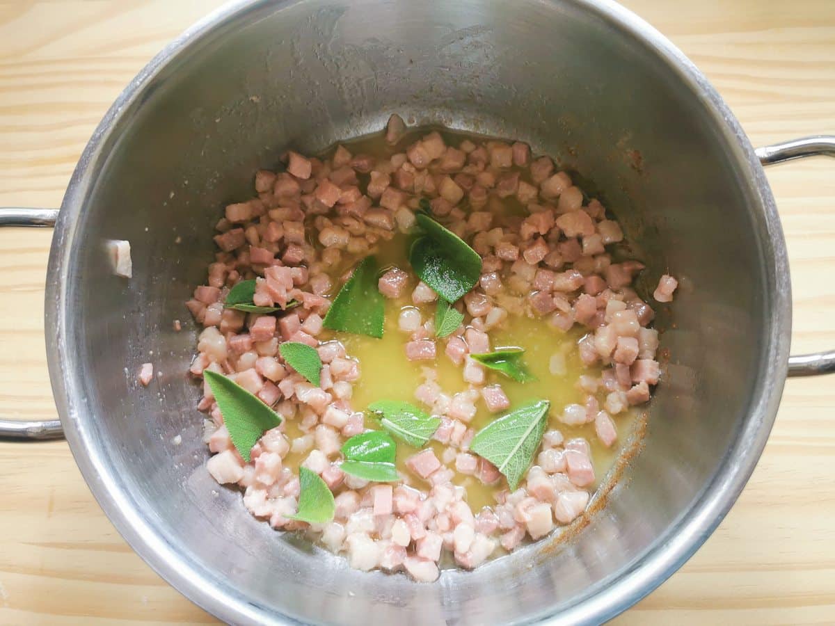 Pancetta, melted butter and sage in pan.