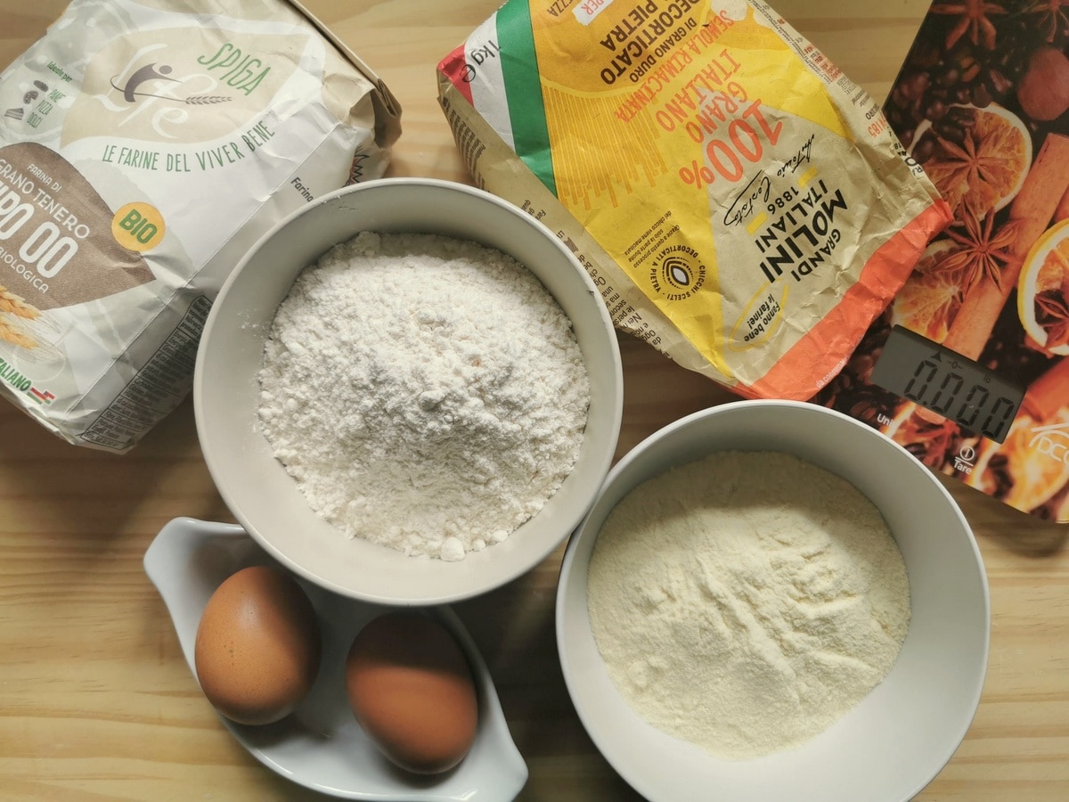 Ingredients for the casoncelli dough on a wood work surface!