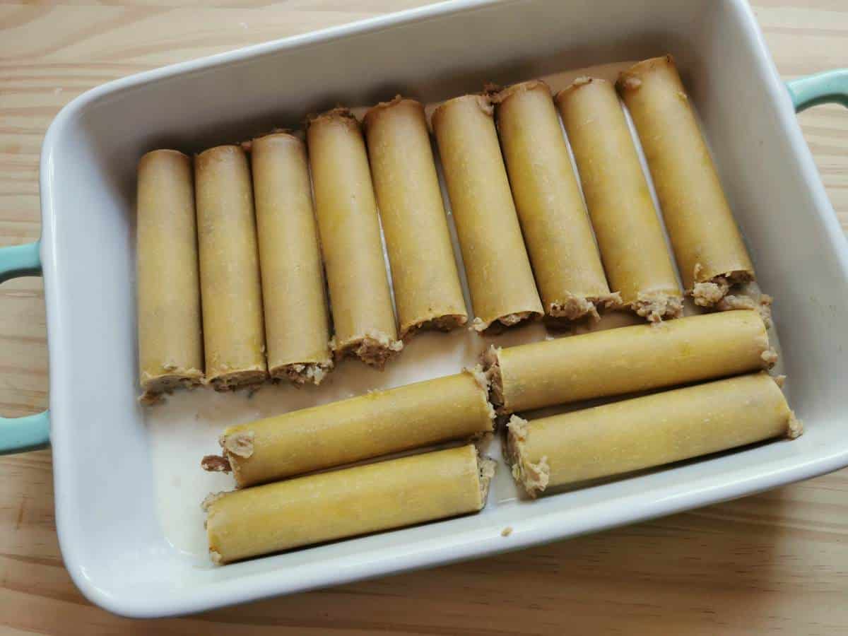 Mushroom cannelloni in a baking dish.