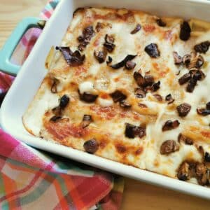 Mushroom cannelloni in a baking dish.