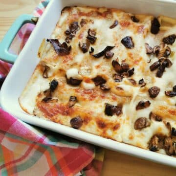 Mushroom cannelloni in a baking dish.