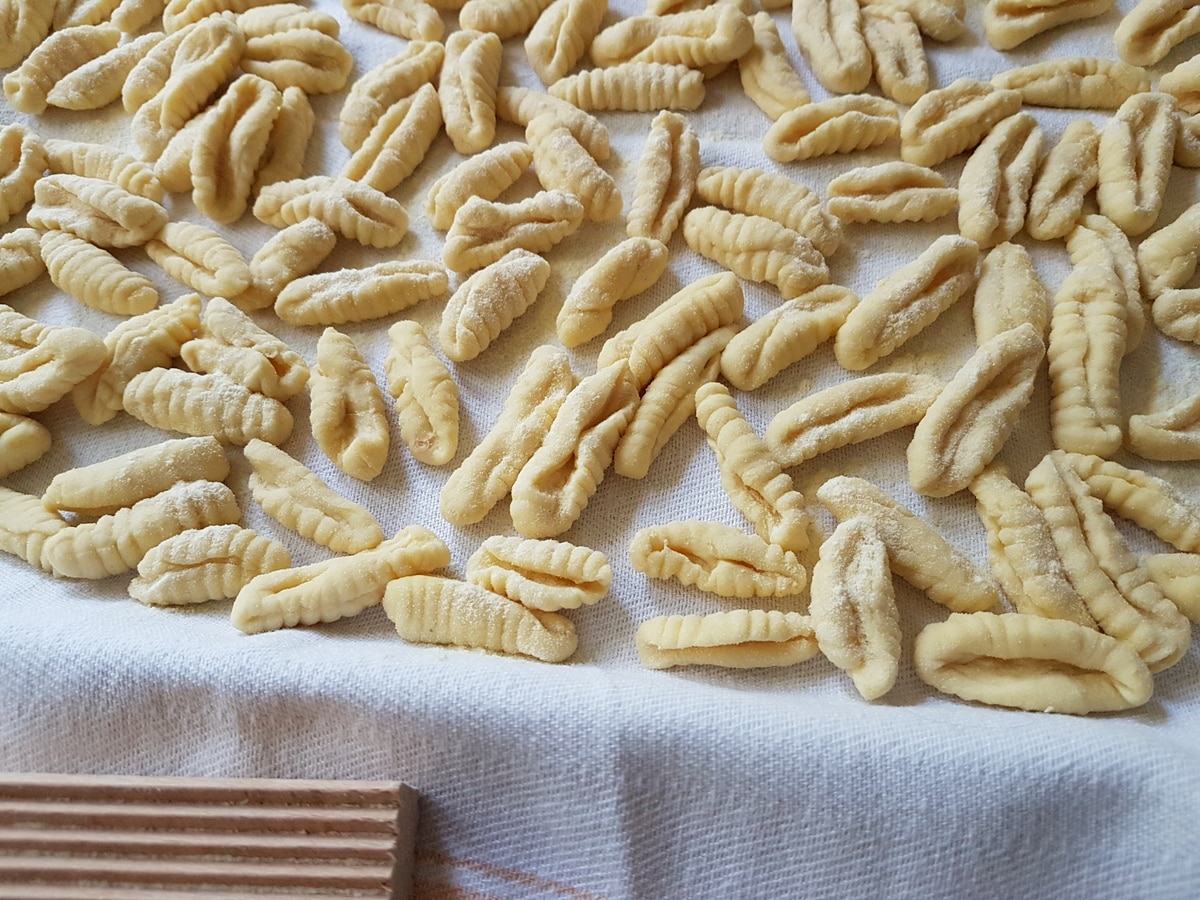 Homemade cavatelli on a tray.