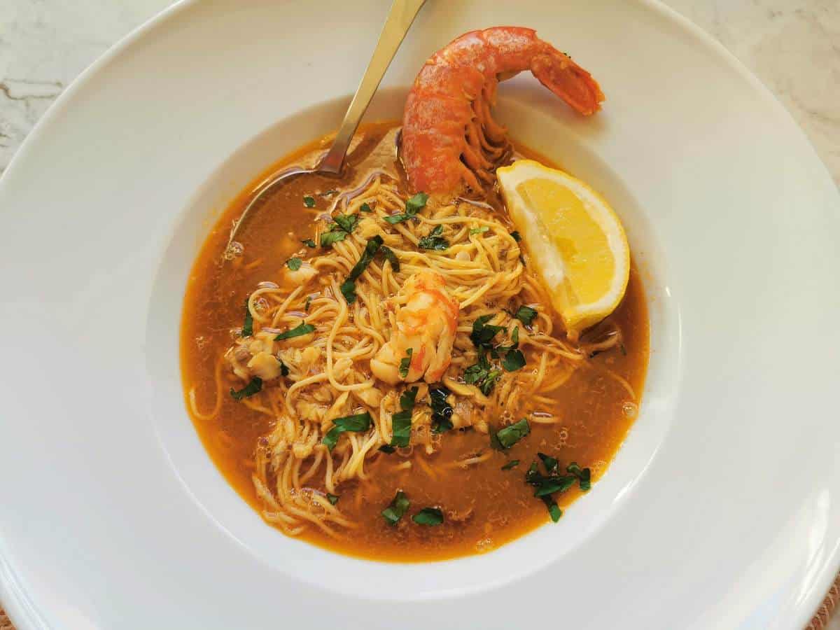 Italian fish soup with angel hair pasta.