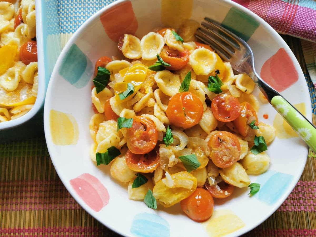 Orecchiette pasta with roasted cherry tomatoes.