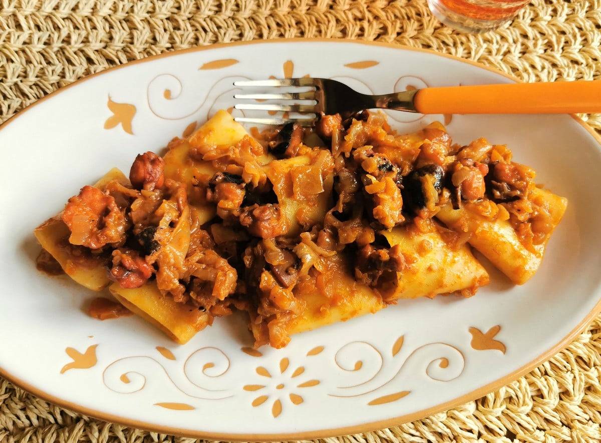 Pasta with octopus alla Genovese, a seafood pasta recipe from Naples.