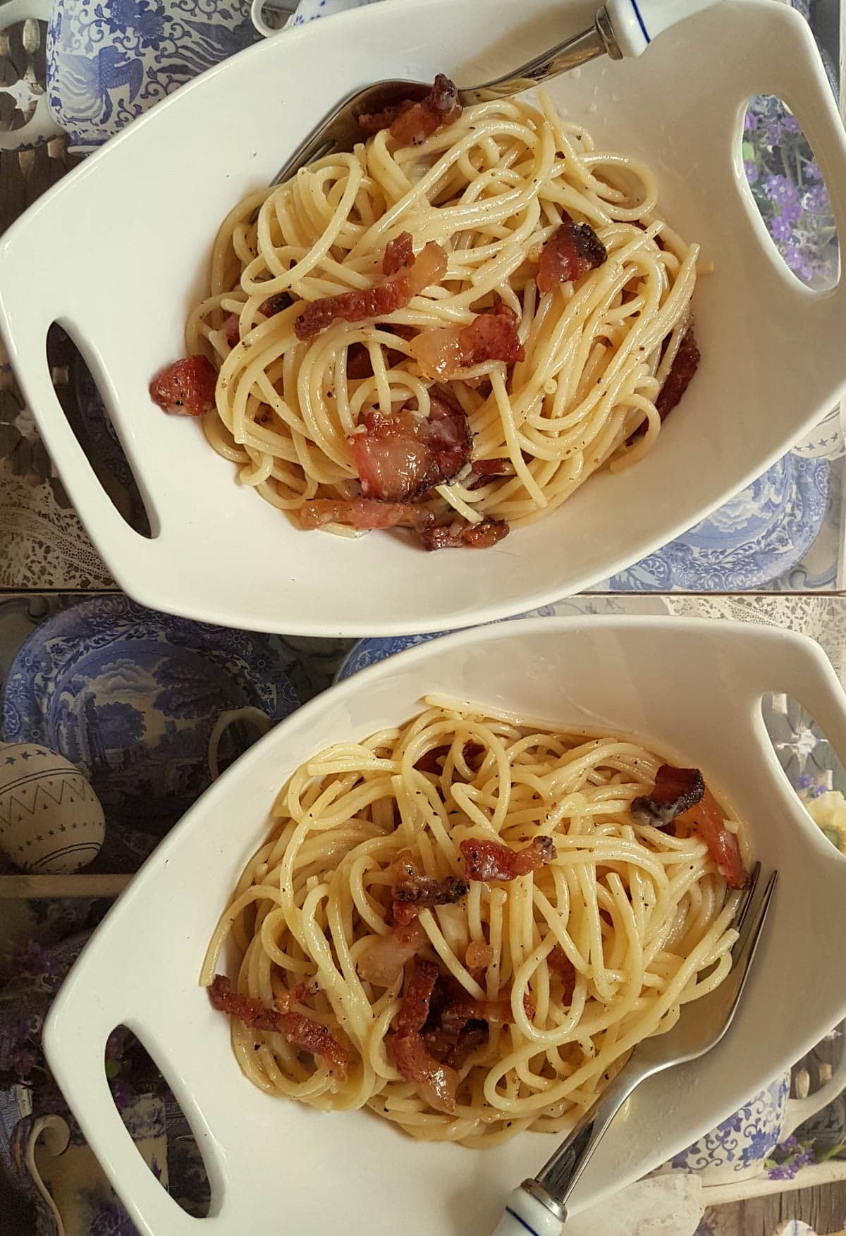 Two bowls of Pasta all gricia.