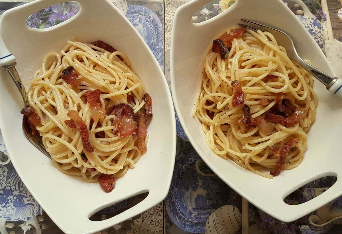 Two bowls of Pasta all gricia.