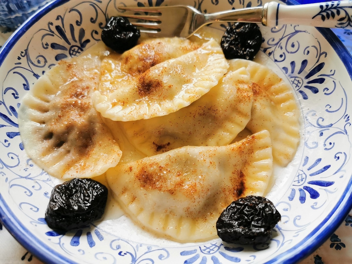 Sweet prune and fig ravioli in a bowl.