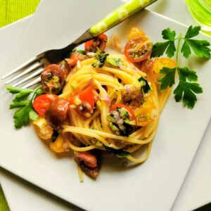 Vermicelli di Positano on a white plate.