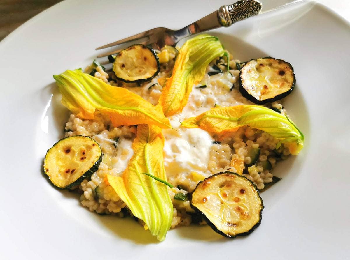 Zucchini flower pasta risotto style.